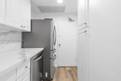 Updated one bedroom and one bathroom unit plus DEN that can be