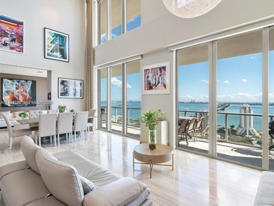 Penthouse 207 is a two-story residence offering expansive