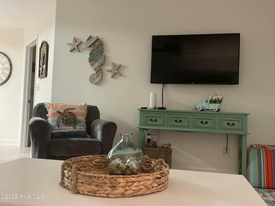 Beautifully updated, FIRST FLOOR, 2BR/2BA condo in the desirable