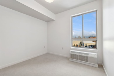 This beautiful 2 bedroom, 2 bath condo on the top floor of the