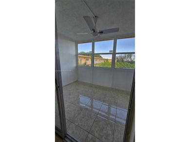 This top-floor unit in the highly sought-after *T* building