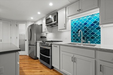 Highly sought after duplex down with loft in New Biscuit Lofts