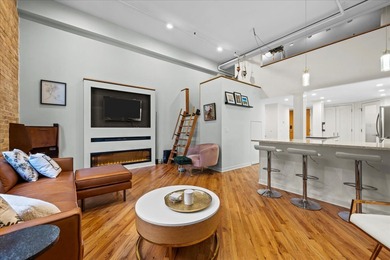 Highly sought after duplex down with loft in New Biscuit Lofts
