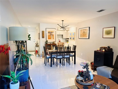 Enjoy living in your dream condo in the heart of Doral, this