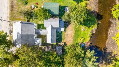 This spacious home sits along the Salmon Falls River, just