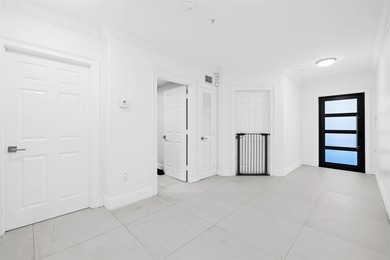 Where elegance meets effortless East Boca Raton living, this