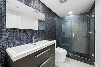 Where elegance meets effortless East Boca Raton living, this