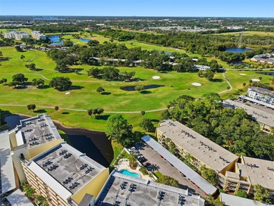 RARE 1,820 SF End Unit Condo with Stunning Golf Course Views!
