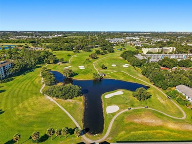 RARE 1,820 SF End Unit Condo with Stunning Golf Course Views!
