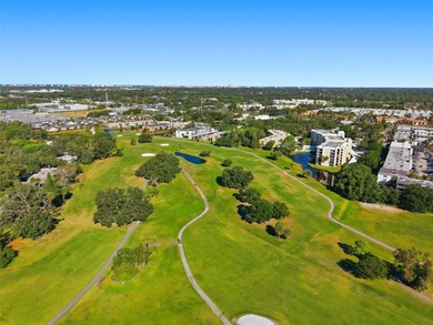 RARE 1,820 SF End Unit Condo with Stunning Golf Course Views!
