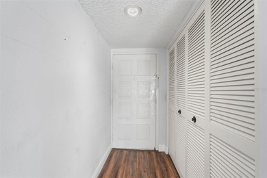 RARE 1,820 SF End Unit Condo with Stunning Golf Course Views!
