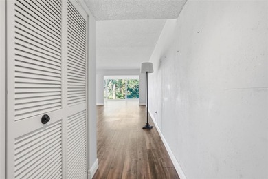 RARE 1,820 SF End Unit Condo with Stunning Golf Course Views!
