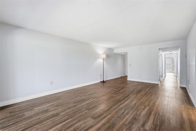 RARE 1,820 SF End Unit Condo with Stunning Golf Course Views!
