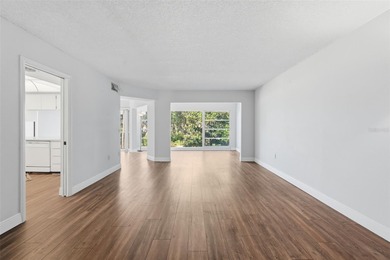 RARE 1,820 SF End Unit Condo with Stunning Golf Course Views!
