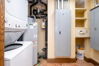 Unique, French Country, Beautiful High Rise Condo in the heart