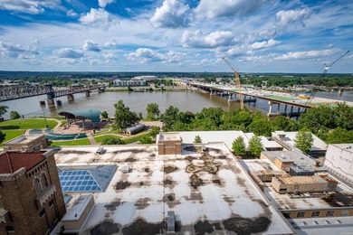 Unique, French Country, Beautiful High Rise Condo in the heart