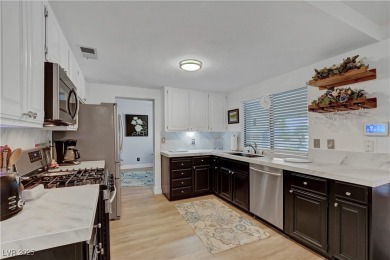 Fully remodeled home in The Lakes! This beautifully upgraded