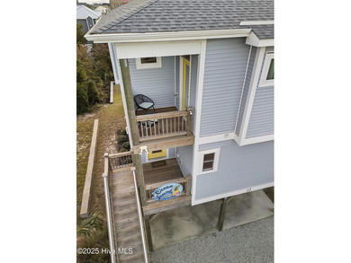 Experience the best of coastal living in this custom-built