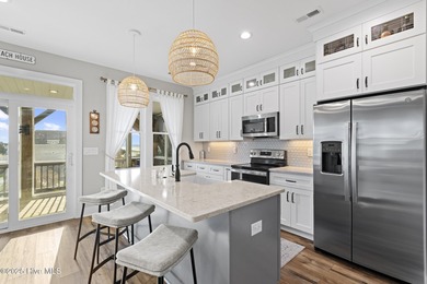 Experience the best of coastal living in this custom-built