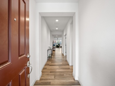 Beautifully maintained and nearly new, this ADA-compliant home