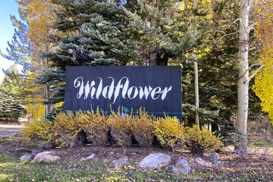 This unique property masterfully blends two Wildflower condo