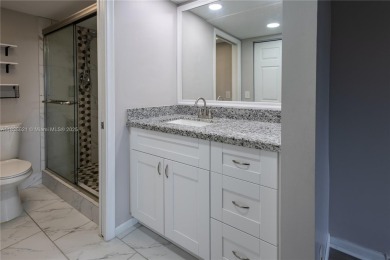 Spacious 2 bedroom 2 bath with large ENCLOSED BALCONY , storage