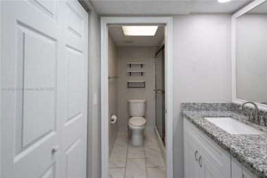 Spacious 2 bedroom 2 bath with large ENCLOSED BALCONY , storage