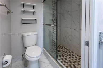 Spacious 2 bedroom 2 bath with large ENCLOSED BALCONY , storage