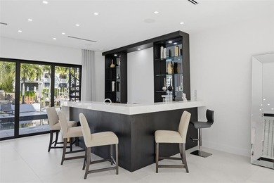 Gorgeous contemporary waterfront residence built in 2021 in the