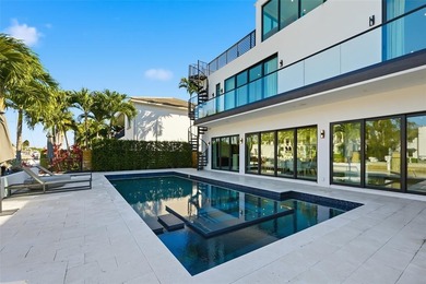 Gorgeous contemporary waterfront residence built in 2021 in the