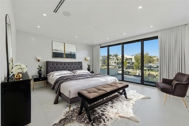 Gorgeous contemporary waterfront residence built in 2021 in the