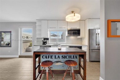 Live large in this gorgeously updated, two bedroom, two full