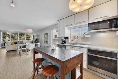 Live large in this gorgeously updated, two bedroom, two full