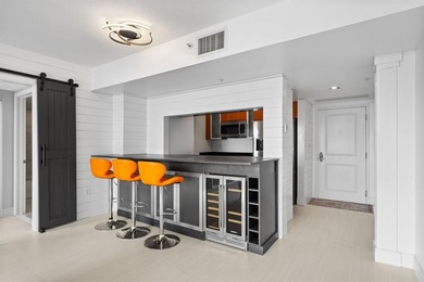 Enjoy this high-floor modern residence at The Symphony with