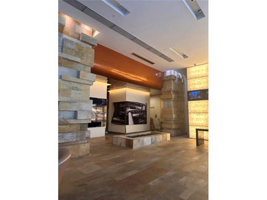 Experience modern urban living at its finest in this stylish