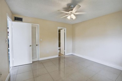 Start your mornings with coffee on the screened-in patio