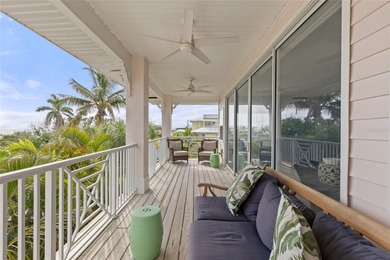 Welcome to this exceptional beach retreat, an exquisite