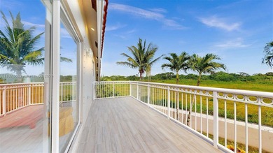 Nestled within the exclusive gated community of Three Lakes, a