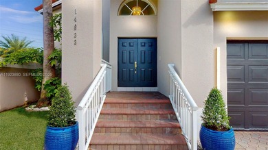 Nestled within the exclusive gated community of Three Lakes, a