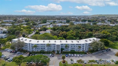 Immaculate and move-in ready first-floor condo offering 1,000 sq