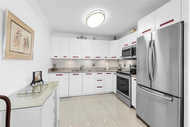 Immaculate and move-in ready first-floor condo offering 1,000 sq