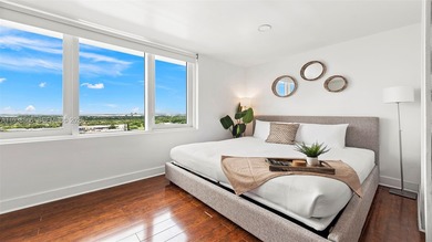 Rare opportunity to own a residence with stunning bay and sunset