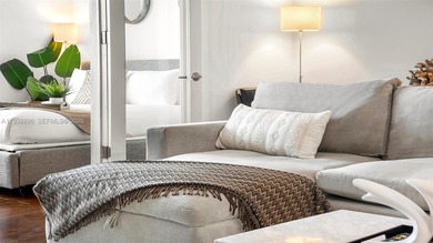 Rare opportunity to own a residence with stunning bay and sunset