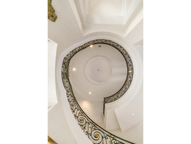 This timeless Euoprean Estate Home sits on 1.6 acres in the