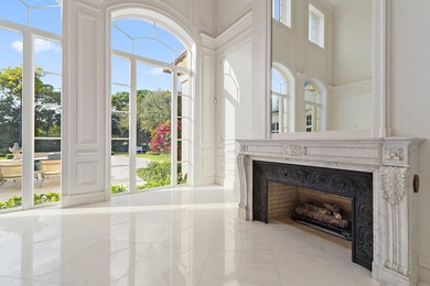 This timeless Euoprean Estate Home sits on 1.6 acres in the