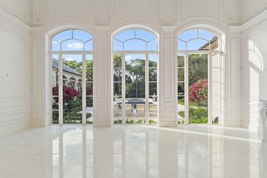 This timeless Euoprean Estate Home sits on 1.6 acres in the