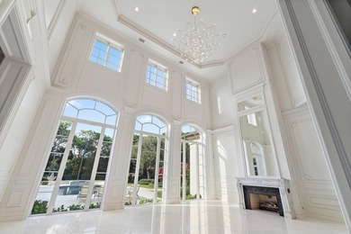 This timeless Euoprean Estate Home sits on 1.6 acres in the