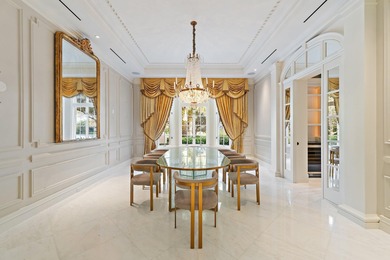 This timeless Euoprean Estate Home sits on 1.6 acres in the