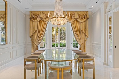 This timeless Euoprean Estate Home sits on 1.6 acres in the