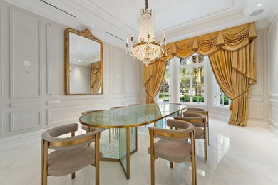 This timeless Euoprean Estate Home sits on 1.6 acres in the